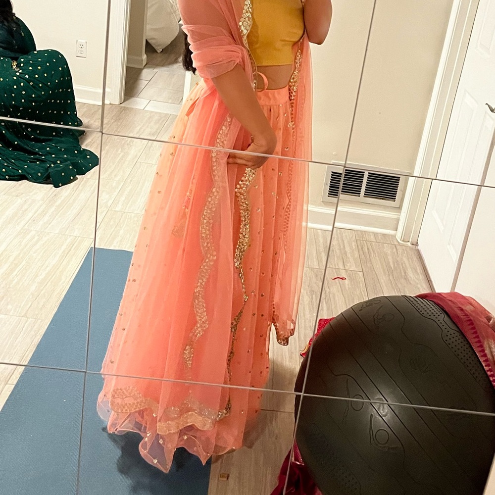 Pink simple skirt and dupatta with golden blouse